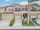 Front view of townhouse with two-car garage at 284 Crew Ct, Sarasota, FL 34243