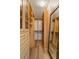 Large walk-in closet with ample shelving and mirror at 284 Crew Ct, Sarasota, FL 34243