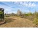 Expansive backyard with a bird bath, perfect for outdoor relaxation and enjoying nature at 2926 Sultan Ct, North Port, FL 34286