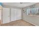 Bedroom with ceiling fan, closet, turtle decor, with a window and comfortable carpet at 2926 Sultan Ct, North Port, FL 34286