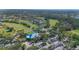 Aerial view of community and surrounding golf course at 3011 Quail Holw # 3011, Sarasota, FL 34235