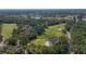 Condo community situated near a golf course and pond at 3011 Quail Holw # 3011, Sarasota, FL 34235