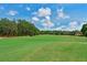 Picturesque golf course with lush greens at 3011 Quail Holw # 3011, Sarasota, FL 34235