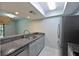 Kitchen with stainless steel appliances and granite countertops at 3011 Quail Holw # 3011, Sarasota, FL 34235