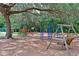 playground with swings and playset at 3011 Quail Holw # 3011, Sarasota, FL 34235