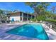 Refreshing community pool with lounge chairs at 3011 Quail Holw # 3011, Sarasota, FL 34235