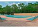 Inviting community pool with ample seating at 3011 Quail Holw # 3011, Sarasota, FL 34235