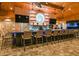 Community clubhouse bar with seating area at 3016 Formia Ct, Bradenton, FL 34211