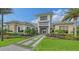 Community clubhouse with landscaped entryway at 3016 Formia Ct, Bradenton, FL 34211