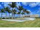 Esplanade community entrance with palm trees at 3016 Formia Ct, Bradenton, FL 34211