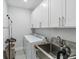 Laundry room with washer, dryer and sink at 3016 Formia Ct, Bradenton, FL 34211