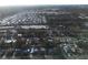 Aerial view of a residential neighborhood with houses and streets at 310 Parkland Ave, Sarasota, FL 34232