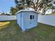 Blue storage shed in backyard at 310 Parkland Ave, Sarasota, FL 34232