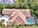 Aerial view showcasing a home with a pool and expansive backyard at 3142 Dick Wilson Dr, Sarasota, FL 34240