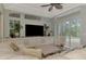 Relaxing Gathering room offers ample seating, large TV, and sliding glass doors to pool at 3142 Dick Wilson Dr, Sarasota, FL 34240