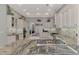 Large kitchen with granite island, custom cabinetry, and high-end appliances at 3142 Dick Wilson Dr, Sarasota, FL 34240