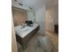 Modern bathroom with double vanity and bathtub at 3455 Anglin Dr, Sarasota, FL 34242