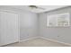 Bedroom with neutral walls and window with blinds at 3762 San Luis Dr, Sarasota, FL 34235