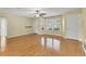 Bright living room featuring hardwood floors and a ceiling fan at 3762 San Luis Dr, Sarasota, FL 34235