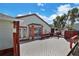 Spacious back deck with built-in benches, ideal for outdoor entertaining at 3815 42Nd W Ave, Bradenton, FL 34205