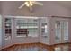 Bright dining area with hardwood floors and large windows overlooking the patio at 3815 42Nd W Ave, Bradenton, FL 34205