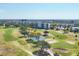 An aerial view of a golf course community featuring lush green landscapes at 3880 Ironwood Ln # 408E, Bradenton, FL 34209