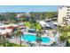 Aerial view of the pool with a cabana and ample seating at 3880 Ironwood Ln # 408E, Bradenton, FL 34209