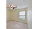 Bright bedroom with ceiling fan and window coverings at 3911 Douglas Hill Pl, Parrish, FL 34219