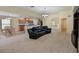 Spacious living area with access to kitchen and dining area at 3911 Douglas Hill Pl, Parrish, FL 34219