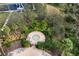 An aerial view of the community spa with surrounding landscaping at 3911 Douglas Hill Pl, Parrish, FL 34219