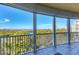 Spacious balcony with scenic water views and ample seating at 393 N Point Rd # 604, Osprey, FL 34229