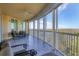 Large screened balcony overlooking the water at 393 N Point Rd # 604, Osprey, FL 34229