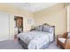 Bright bedroom with a queen-size bed and en-suite bathroom at 393 N Point Rd # 604, Osprey, FL 34229