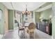 Elegant dining room showcasing a wood table and sideboard at 393 N Point Rd # 604, Osprey, FL 34229