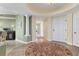 Elegant entryway with tiled floors and decorative rug at 393 N Point Rd # 604, Osprey, FL 34229