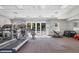 Well-equipped fitness center with cardio and weight machines at 393 N Point Rd # 604, Osprey, FL 34229