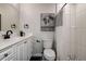 Modern bathroom with white vanity and hexagon tile floor at 3950 Sawyerwood Rd, Sarasota, FL 34233