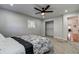 Bedroom with floral bedding and walk-in closet at 3950 Sawyerwood Rd, Sarasota, FL 34233