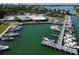 Aerial view of marina with many boats and docks at 419 Partridge Cir, Sarasota, FL 34236