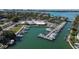 Aerial view of marina and clubhouse with boats docked at 419 Partridge Cir, Sarasota, FL 34236