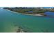 Aerial view of waterfront property and lagoon at 419 Partridge Cir, Sarasota, FL 34236