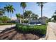 Elegant entrance to Bird Key with a fountain and lush landscaping at 419 Partridge Cir, Sarasota, FL 34236