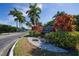 Entrance to Bird Key Yacht Club with lush landscaping and signage at 419 Partridge Cir, Sarasota, FL 34236