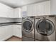 Bright laundry room with modern LG washer and dryer at 419 Partridge Cir, Sarasota, FL 34236