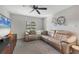 Relaxing living room with sectional sofa and large TV at 419 Partridge Cir, Sarasota, FL 34236