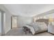 Spacious main bedroom with plush bed and access to the outside at 419 Partridge Cir, Sarasota, FL 34236