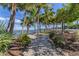 Pathway through park with bench at 419 Partridge Cir, Sarasota, FL 34236