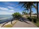 Scenic waterfront path with palm trees at 419 Partridge Cir, Sarasota, FL 34236