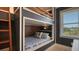 Charming built-in bunk beds with nautical theme at 421 Pine Ave, Anna Maria, FL 34216