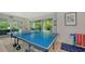 Fun game room, featuring a ping pong table and other games at 421 Pine Ave, Anna Maria, FL 34216